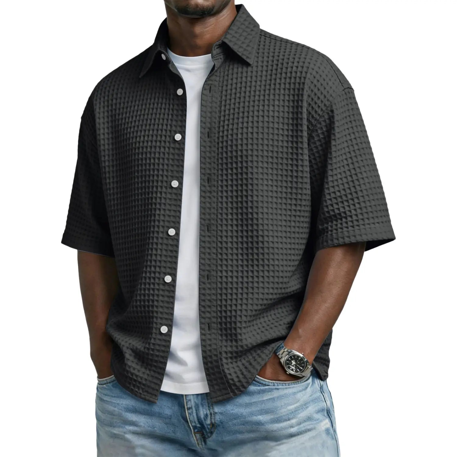 Men’s dark gray waffle knit short sleeve polo shirt with button-up front and white buttons.