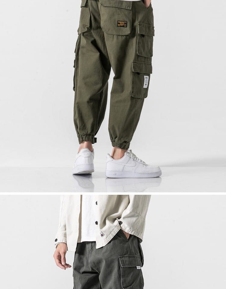 Pantalones cargo militares japoneses casuales color verde oliva, de tiro cónico, con múltiples bolsillos y puños elásticos, diseñados para la utilidad y la comodidad