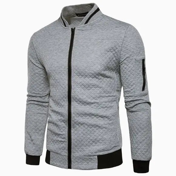 Men’s quilted colorblock bomber jacket in gray with black zipper collar trim and sleeve cuffs featuring a stand collar.