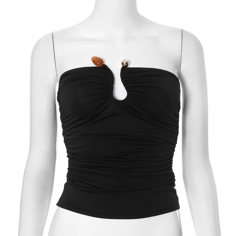 Black ruched strapless keyhole crop top with distinctive neckline and two decorative buttons one amber-colored and one metallic.