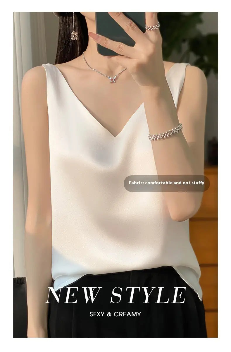 white satin sleeveless silky satin v-neck camisole top with a smooth texture and elegant drape