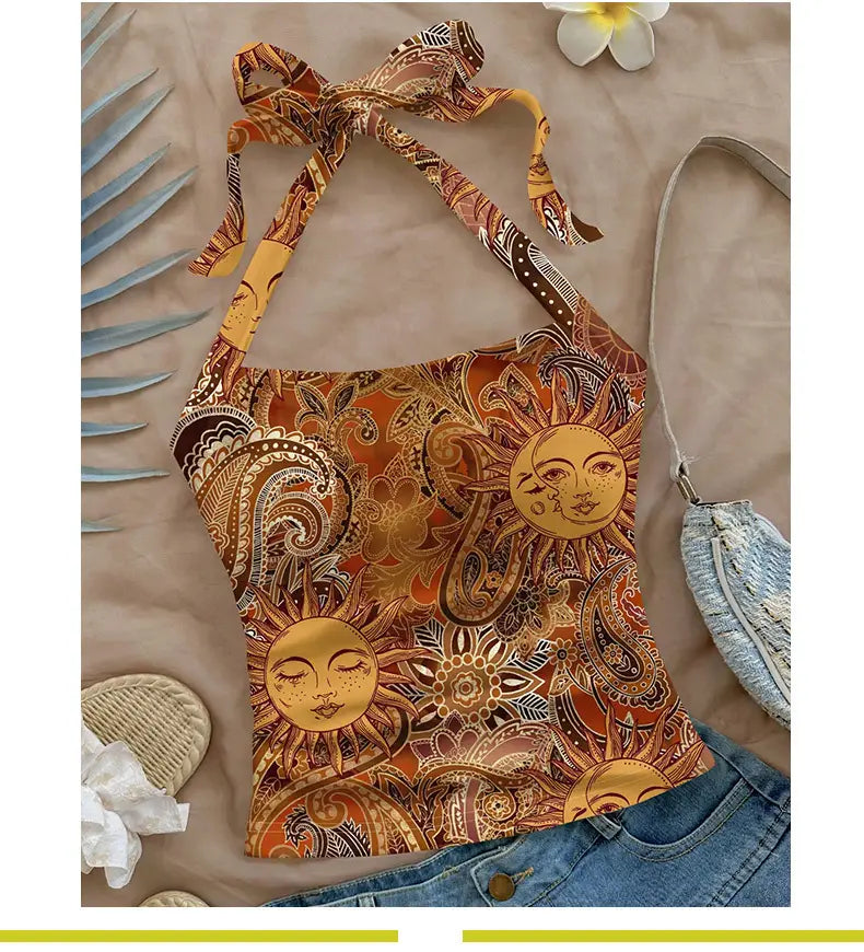 Ein leuchtendes Orange-Paisley-Haltertop mit aufwendigen Sonnen-Motiven und geschlossenen Augen-Gesichtern, gefertigt aus fließendem Stoff in einem Slim-Fit-Design.