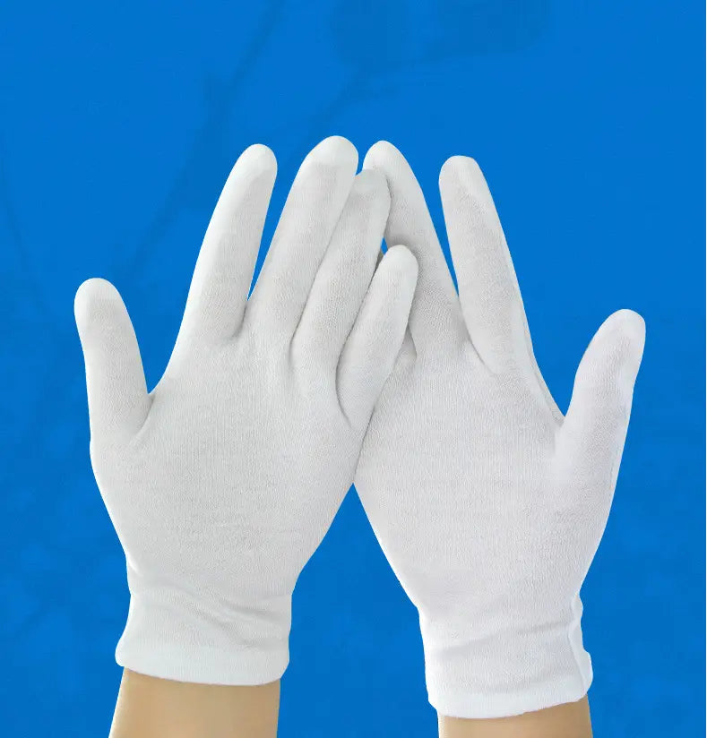 Men’s white cotton work gloves with a snug fit and reinforced fingertips shown from the back side.