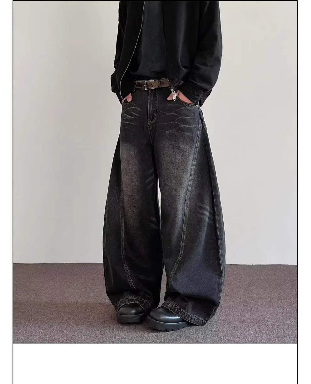 Men’s premium relaxed wide leg denim jeans in dark wash with subtle fading details and a relaxed fit.