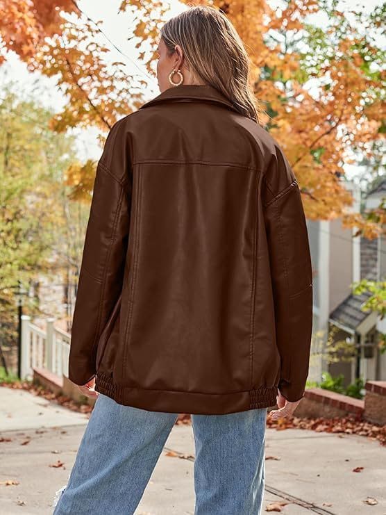 Brown faux leather bomber jacket with oversized relaxed fit and classic collar.