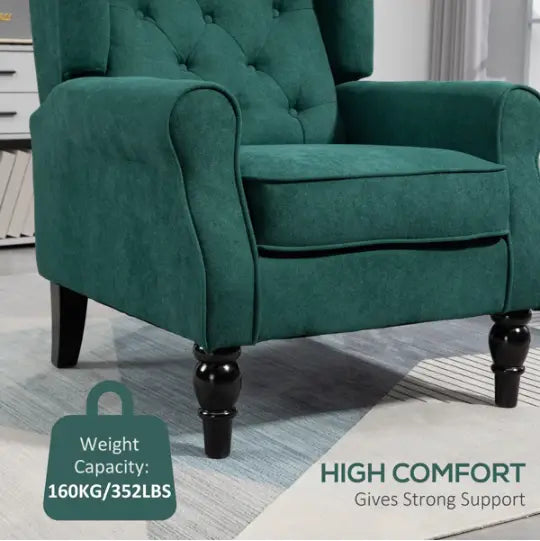 Fauteuil d’appoint en velours vert émeraude capitonné avec pieds en bois noirs, conçu pour un assise élégante.