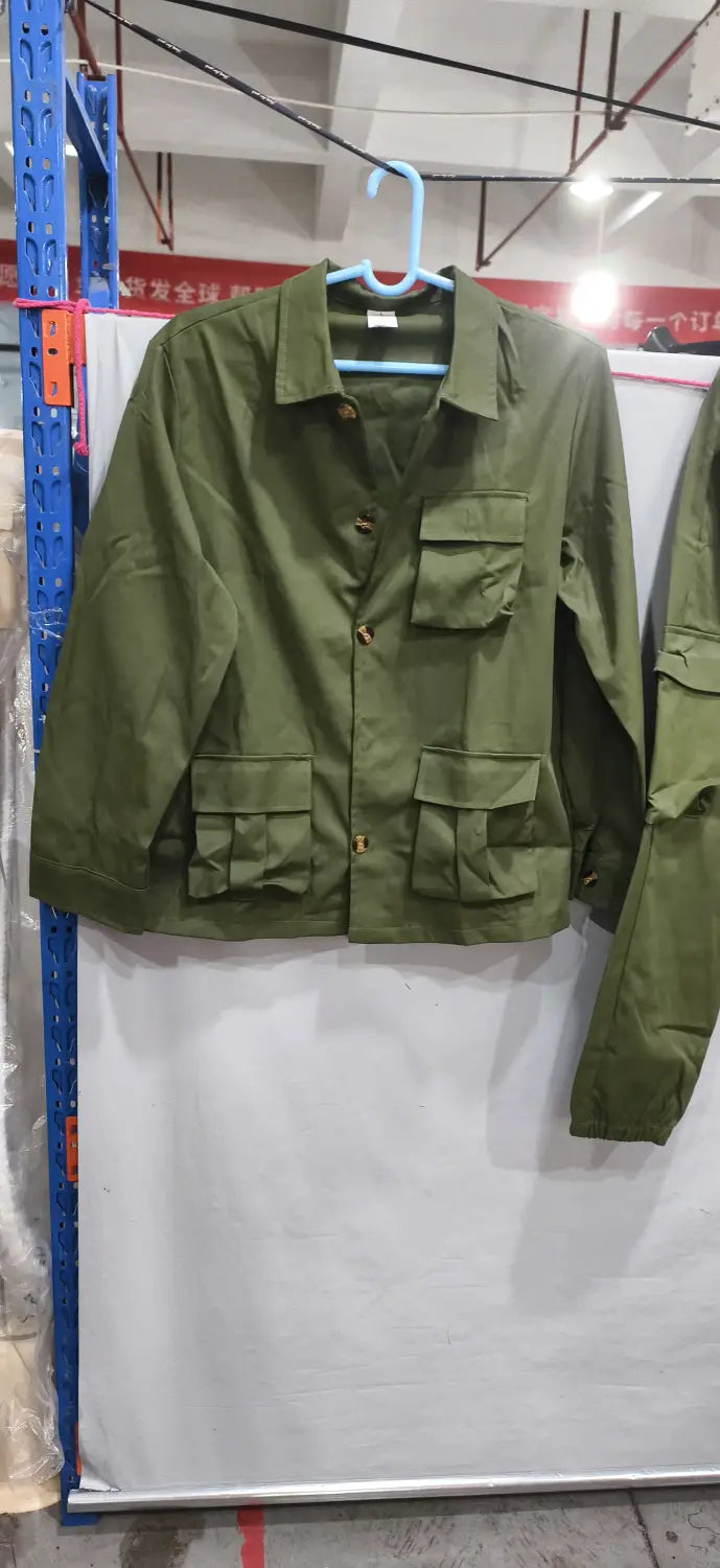 Men vintage cargo jacket in olive green featuring multiple flap pockets and button closures in a utility design.