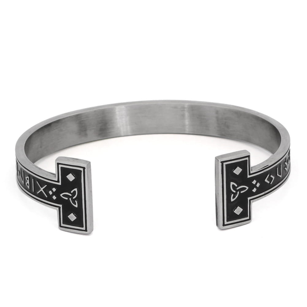 Silver-toned adjustable Viking rune titanium steel open cuff bracelet featuring black inlaid Celtic knot and rune designs on its rectangular ends.