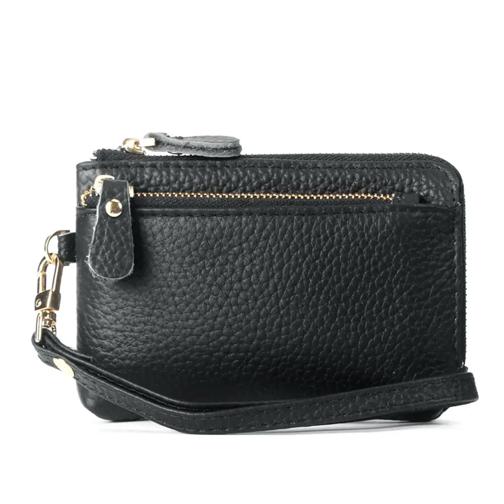 Black textured leather wristlet wallet featuring gold-toned zipper and hardware for premium style and functionality.