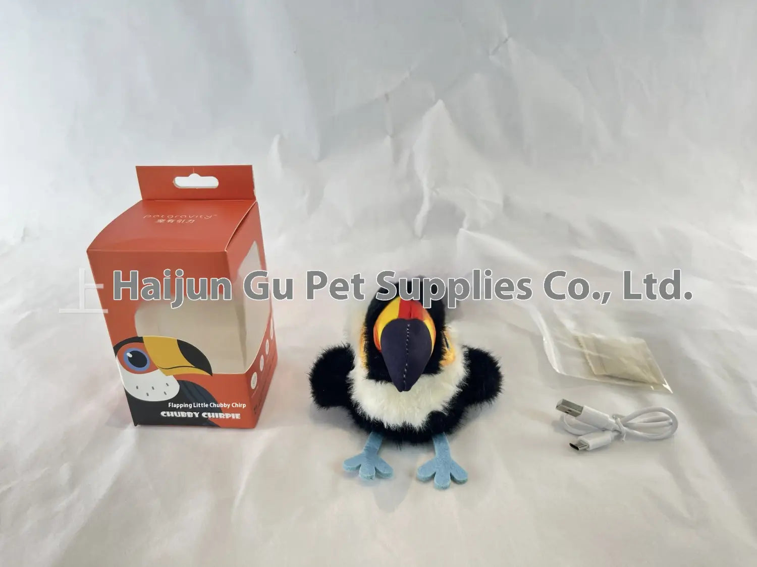 interactive bird cat toy plush toucan with black and white soft fabric body colorful beak and blue feet featuring automatic sounding function