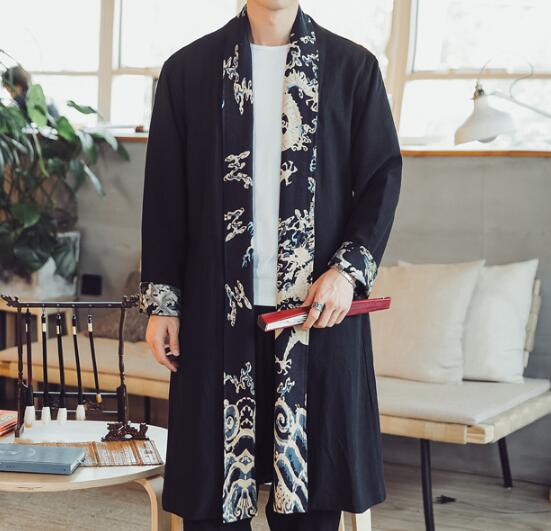 Plus size dragon embroidered mens long coat in black featuring intricate white and gray dragon embroidery along the front opening cuffs and hem.