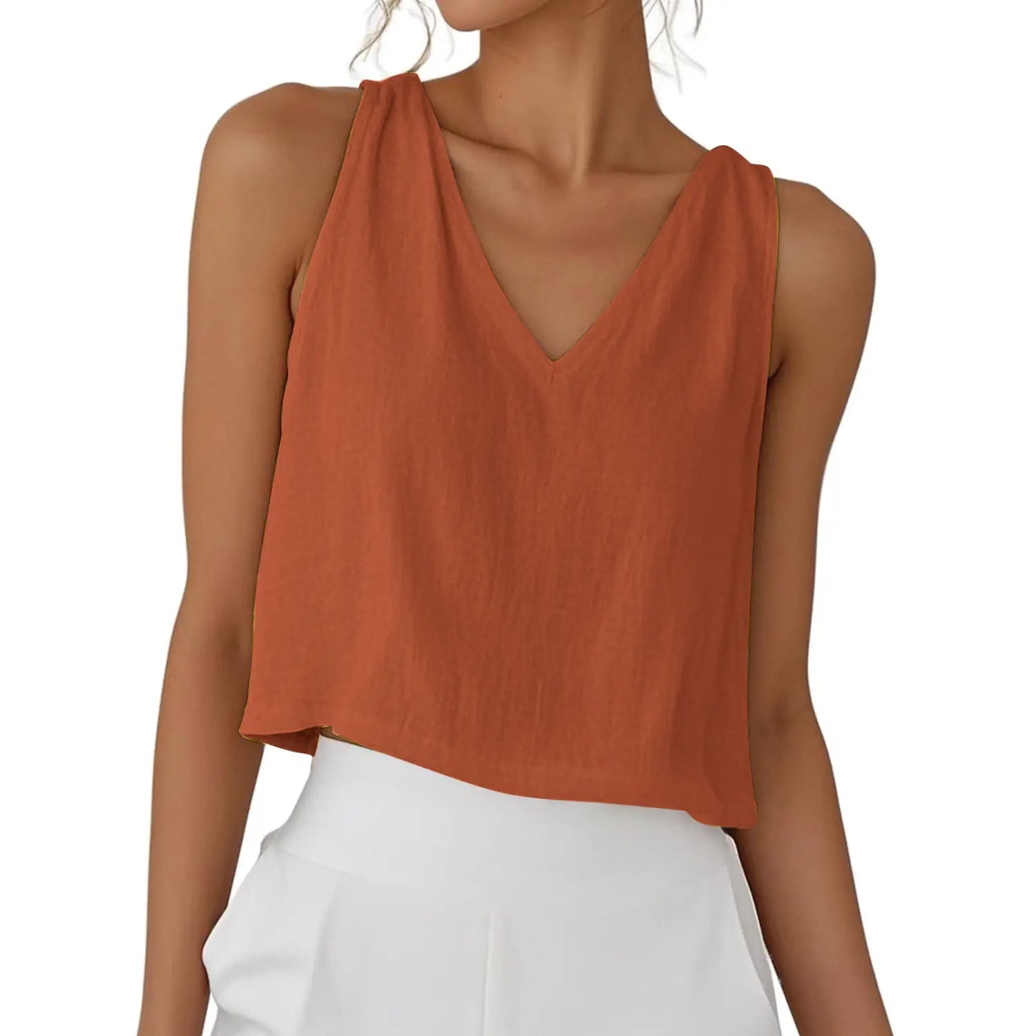 Ein sanftes rostfarbenes Baumwoll-Leinen-Camisole-Top ohne Ärmel mit V-Ausschnitt, lockerer Passform und Crop-Länge.