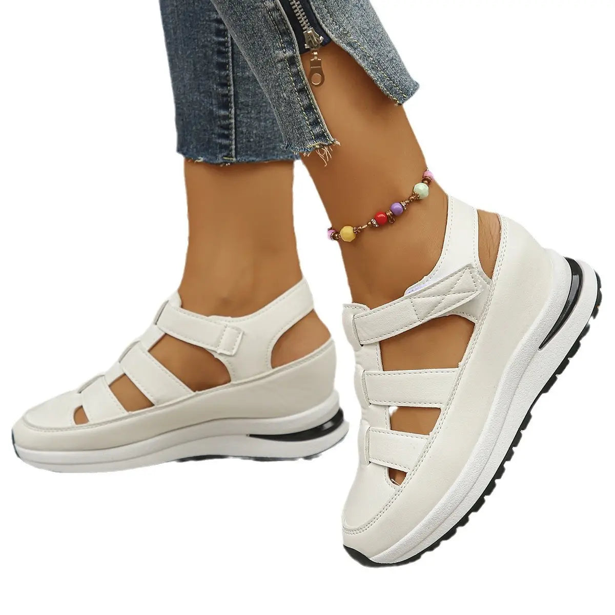 White breathable hollow wedge platform sandals featuring a thick cushioned sole and adjustable velcro strap closures.