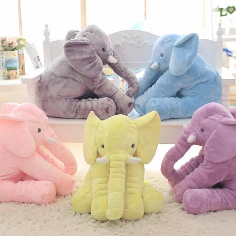 Jouet en peluche représentant un éléphant, coussins d’animal en peluche doux pour les enfants, dans des couleurs pastel assorties, notamment rose, jaune, violet, gris et bleu, fabriqué en matériau en peluche.