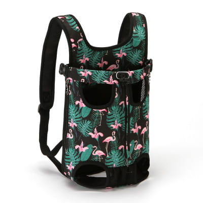 Breathable black pet carrier backpack featuring a vibrant pink flamingo and green tropical leaf pattern designed for small dogs and cats.