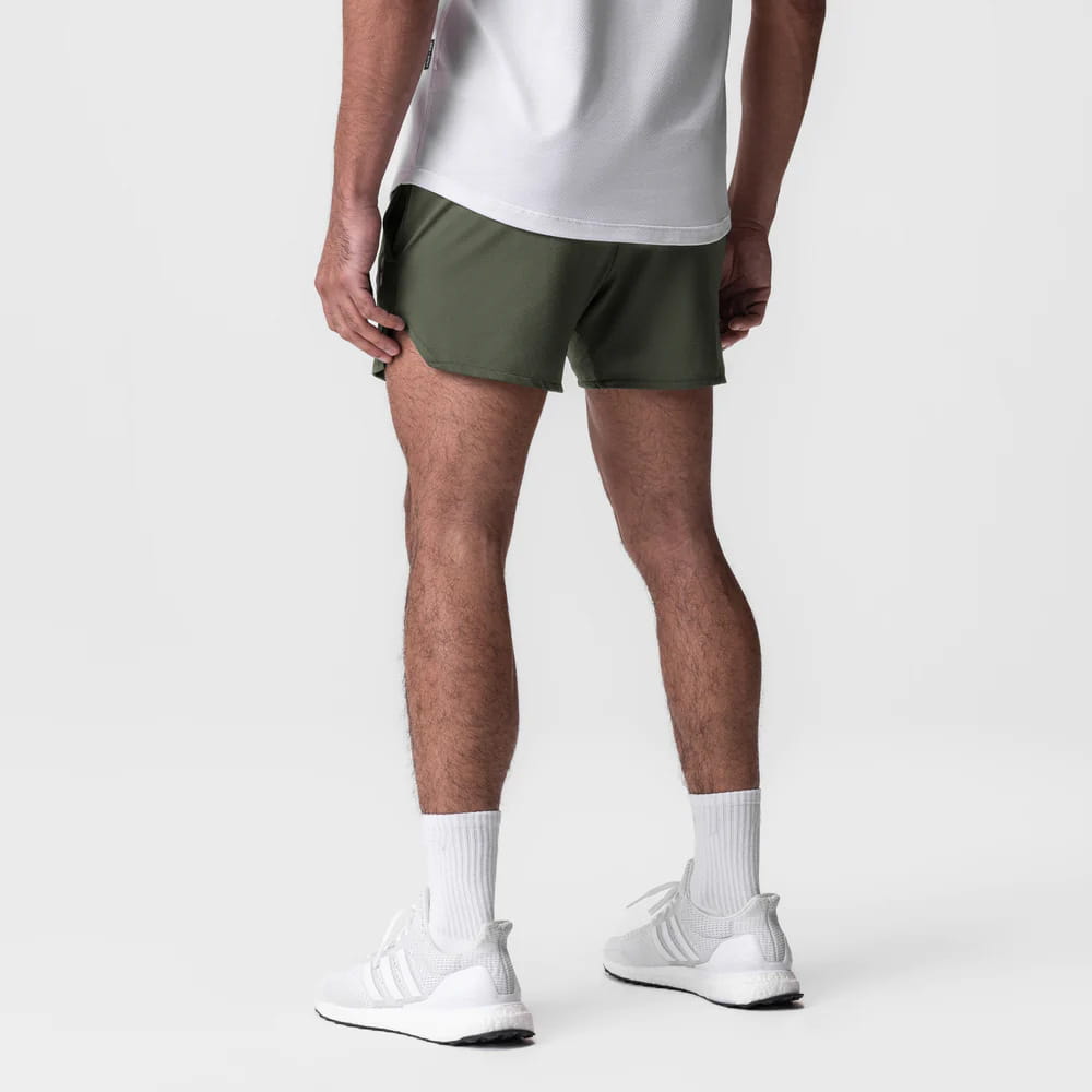 Men quick dry athletic sports shorts in olive green featuring sleek, lightweight fabric and subtle side seam detailing.