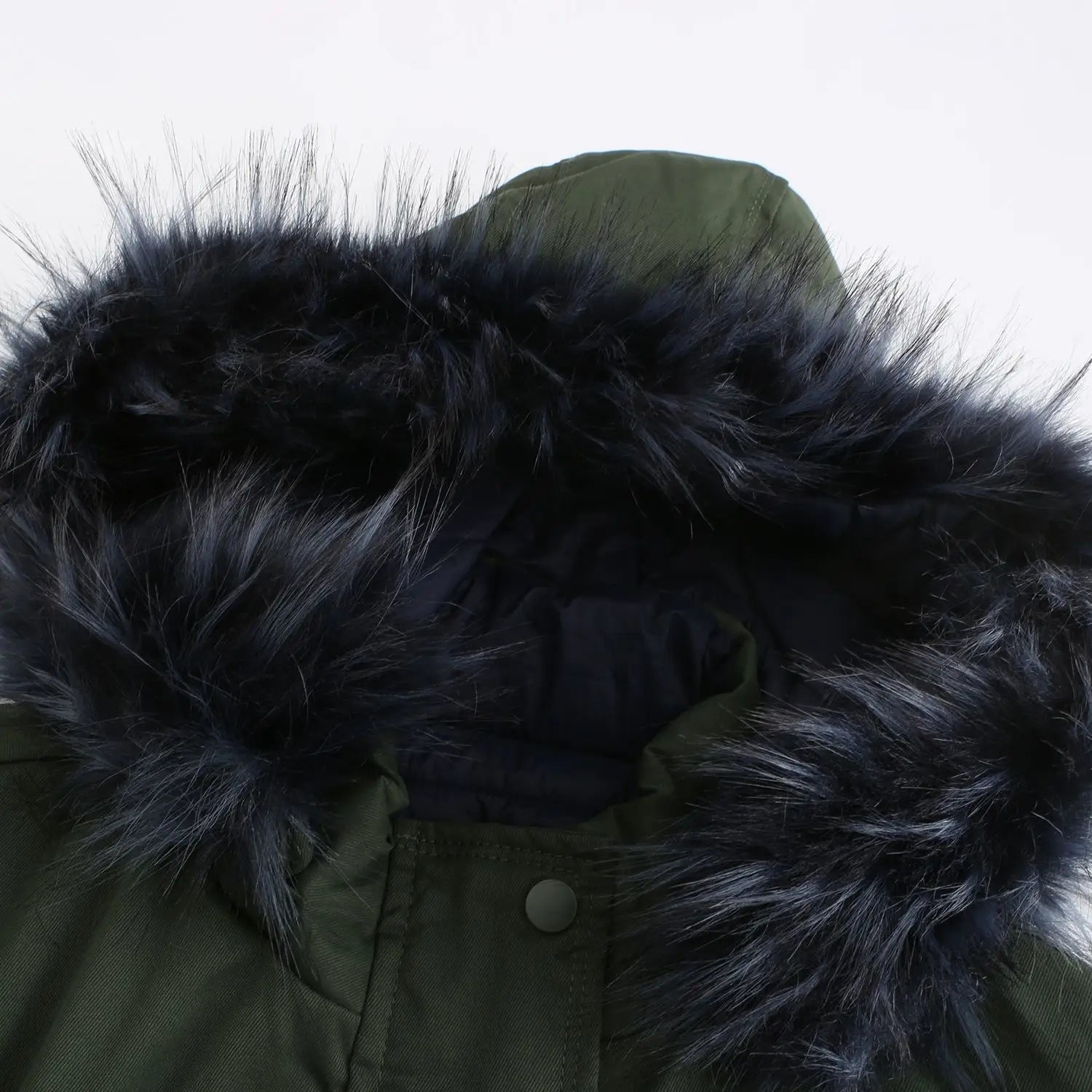 Olive green reversible fur collar quilted parka featuring a plush black fur-lined hood.