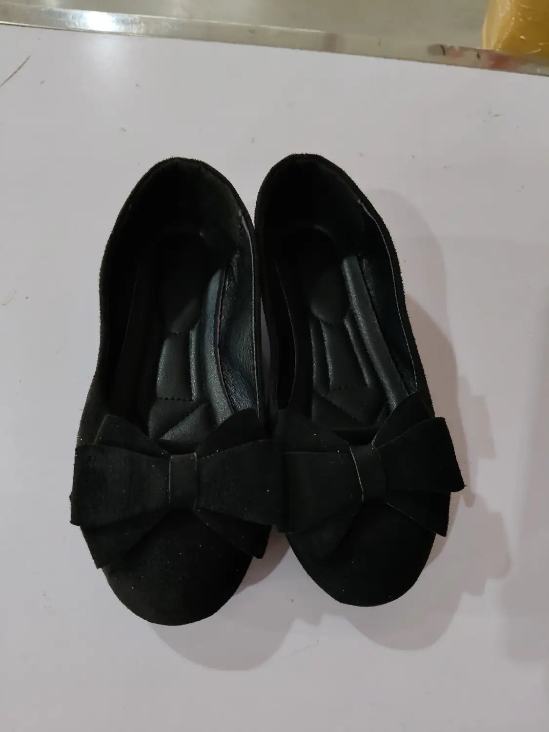 Women’s magenta suede bow round toe flat gommino loafers featuring matching bow accents for elegant wear.