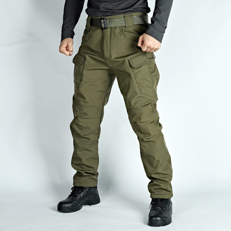 men’s olive green fleece-lined waterproof tactical pants featuring multiple cargo pockets and a reinforced belt loop system.