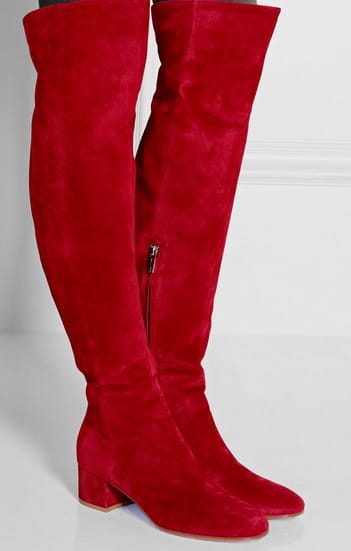 Red suede over the knee boots with a low block heel shown from the back side.