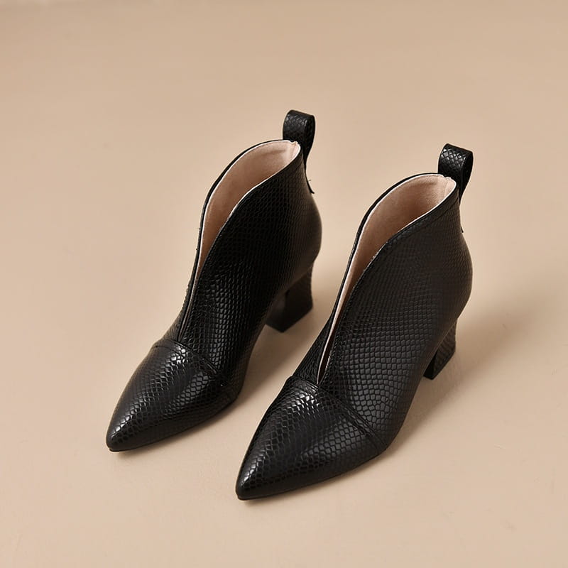black snakeskin ankle boots with v cut pointed toe and low block heel in a textured finish