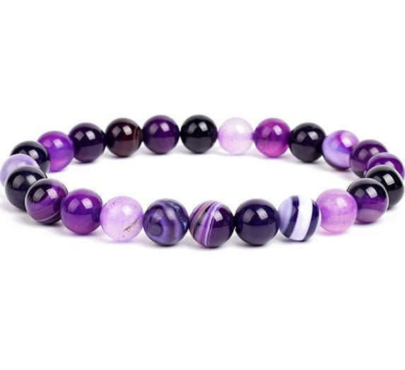A unisex 8mm polished agate and amethyst stretch bracelet composed of smooth beads in various shades of purple and black with some featuring striped patterns.