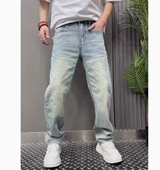 Men’s light wash relaxed straight leg denim jeans featuring a casual modern look with subtle fading on light-wash denim fabric.
