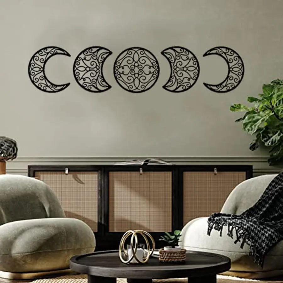 black metal wall art featuring five intricately designed moon phases in a sequence for decorative home use.