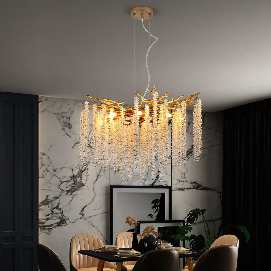 24 inch gold crystal waterfall pendant light featuring a golden branch-style chandelier with cascading crystal strands.