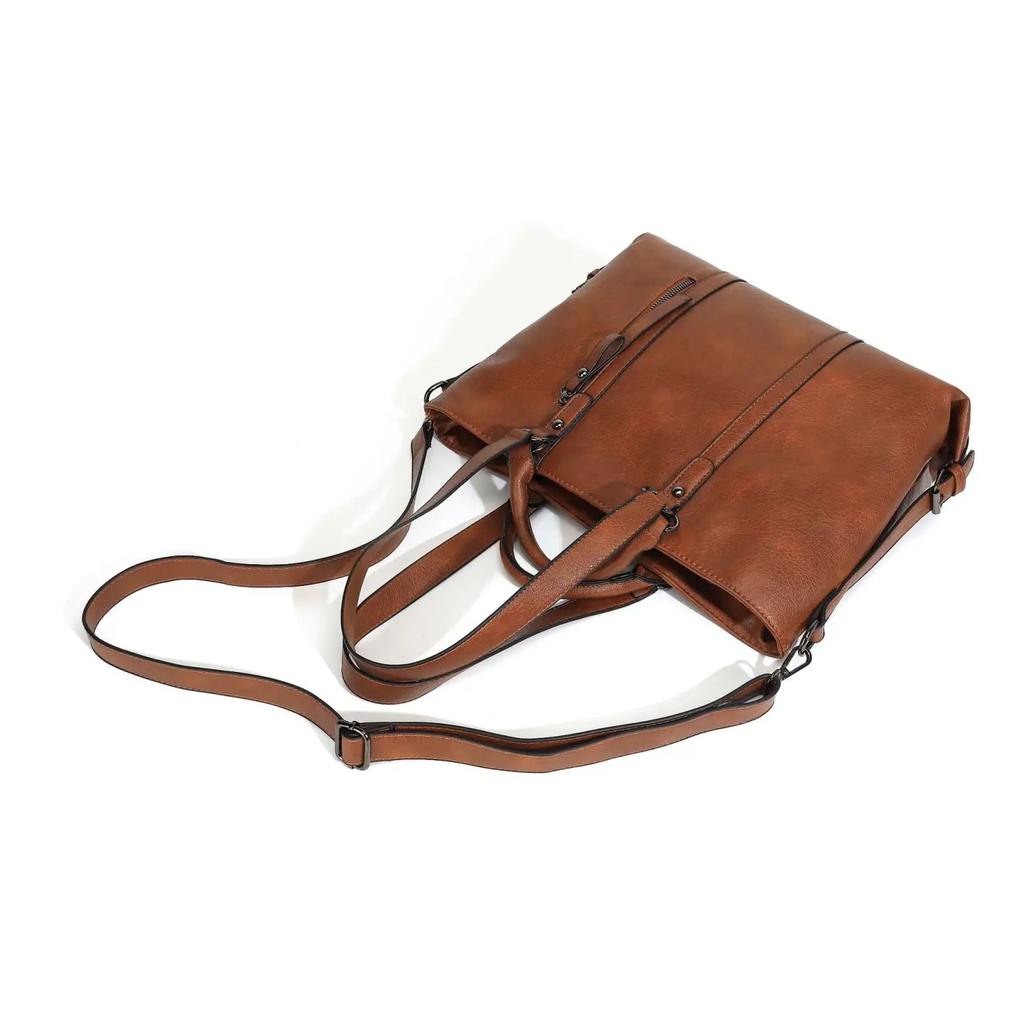 Brown leather large capacity tote bag with adjustable shoulder strap and front zipper closure.