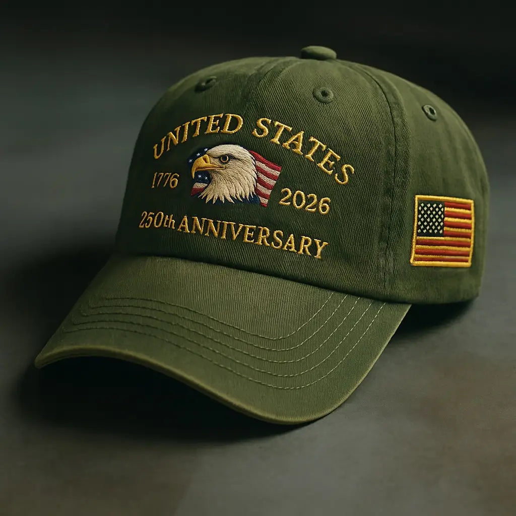 Olive green baseball cap featuring embroidered united states 1776 2026 250th anniversary text with a bald eagle and american flag along with a small patch of the U.S., usa 250th anniversary eagle baseball cap.
