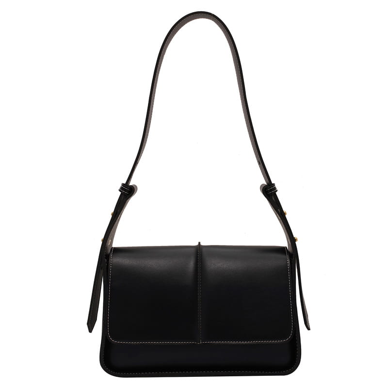 Black leather crossbody bag with a sleek minimalist design and contrasting white stitching along the edges.