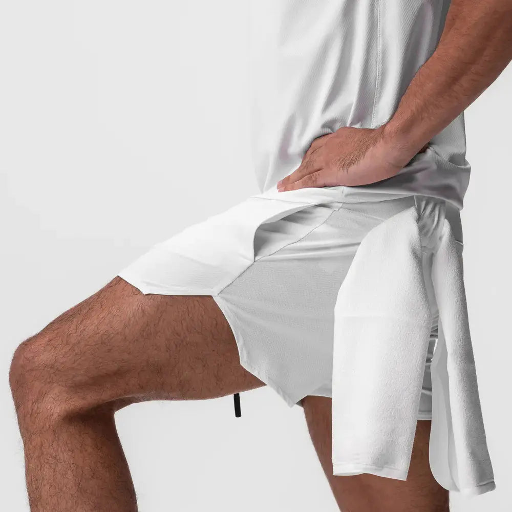 Men quick dry athletic sports shorts in white featuring a sleek modern design and side pockets.