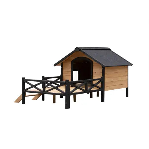 Large wooden dog house with black roof porch matching railings and ramp for easy access.
