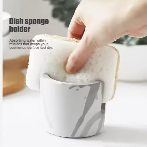 white ceramic dish sponge holder with gray abstract brushstroke design made of diatom mud for use as a sink caddy holder