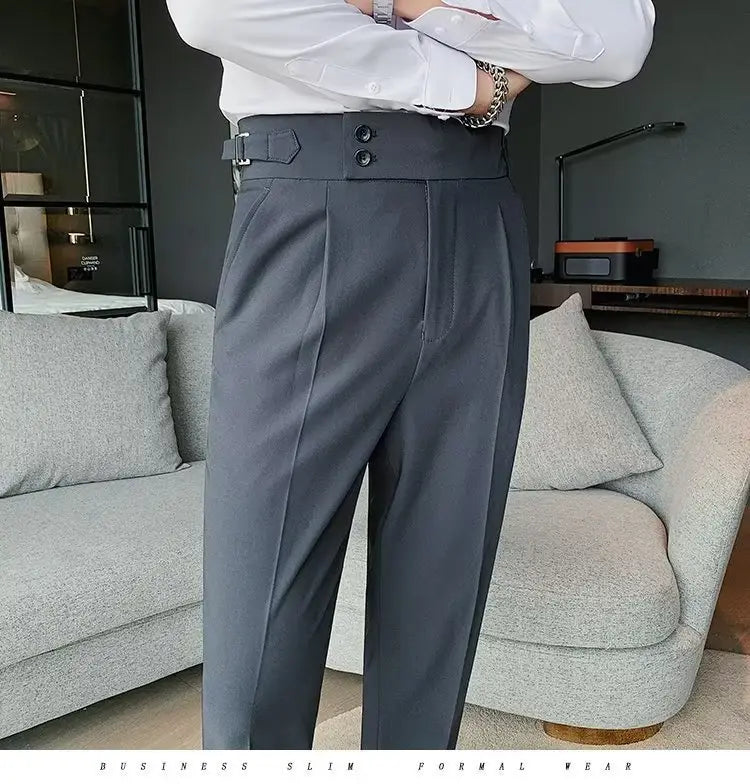 Dark gray slim-fit formal Korean style men trousers with a structured waistband and two-button closure.