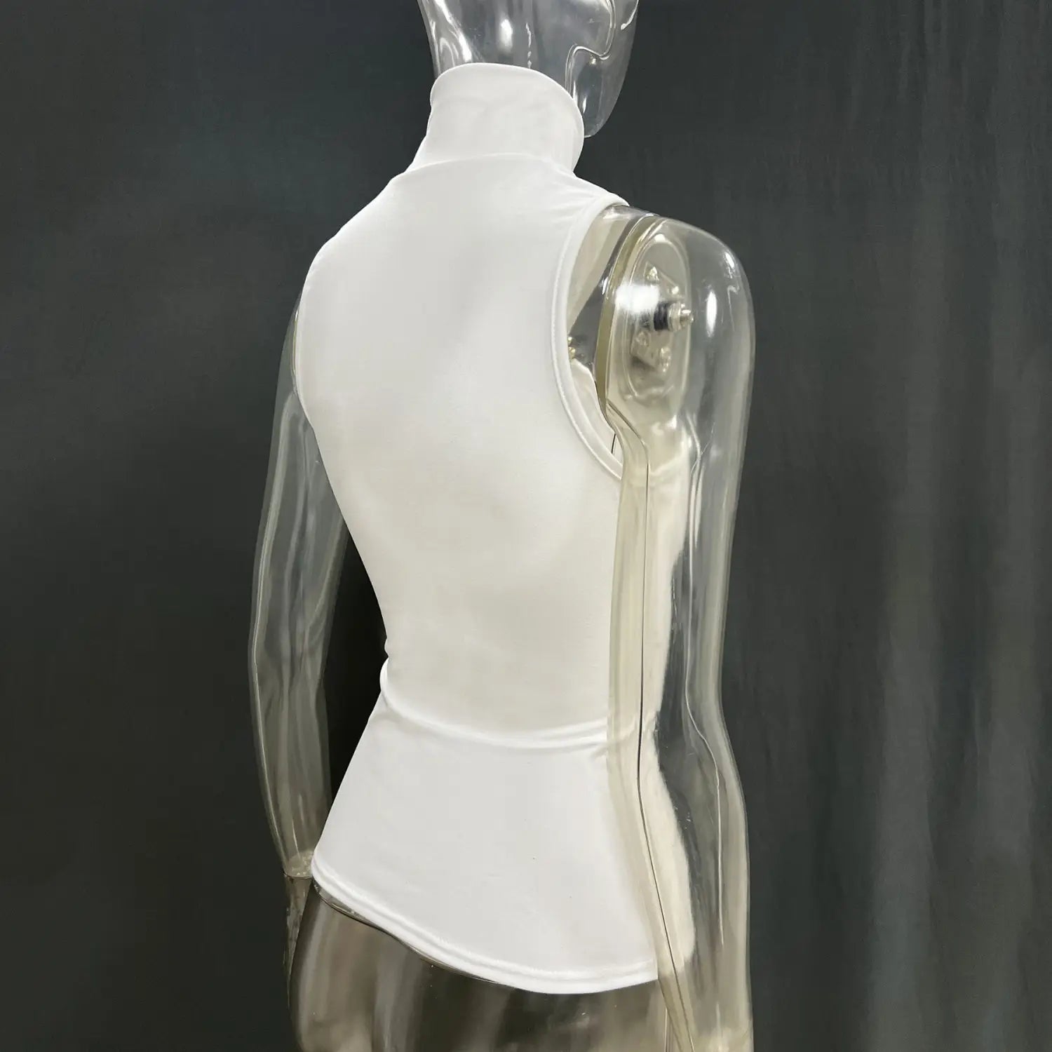 white gold ring halter stretch top featuring a high-neck sleeveless design displayed on a transparent mannequin