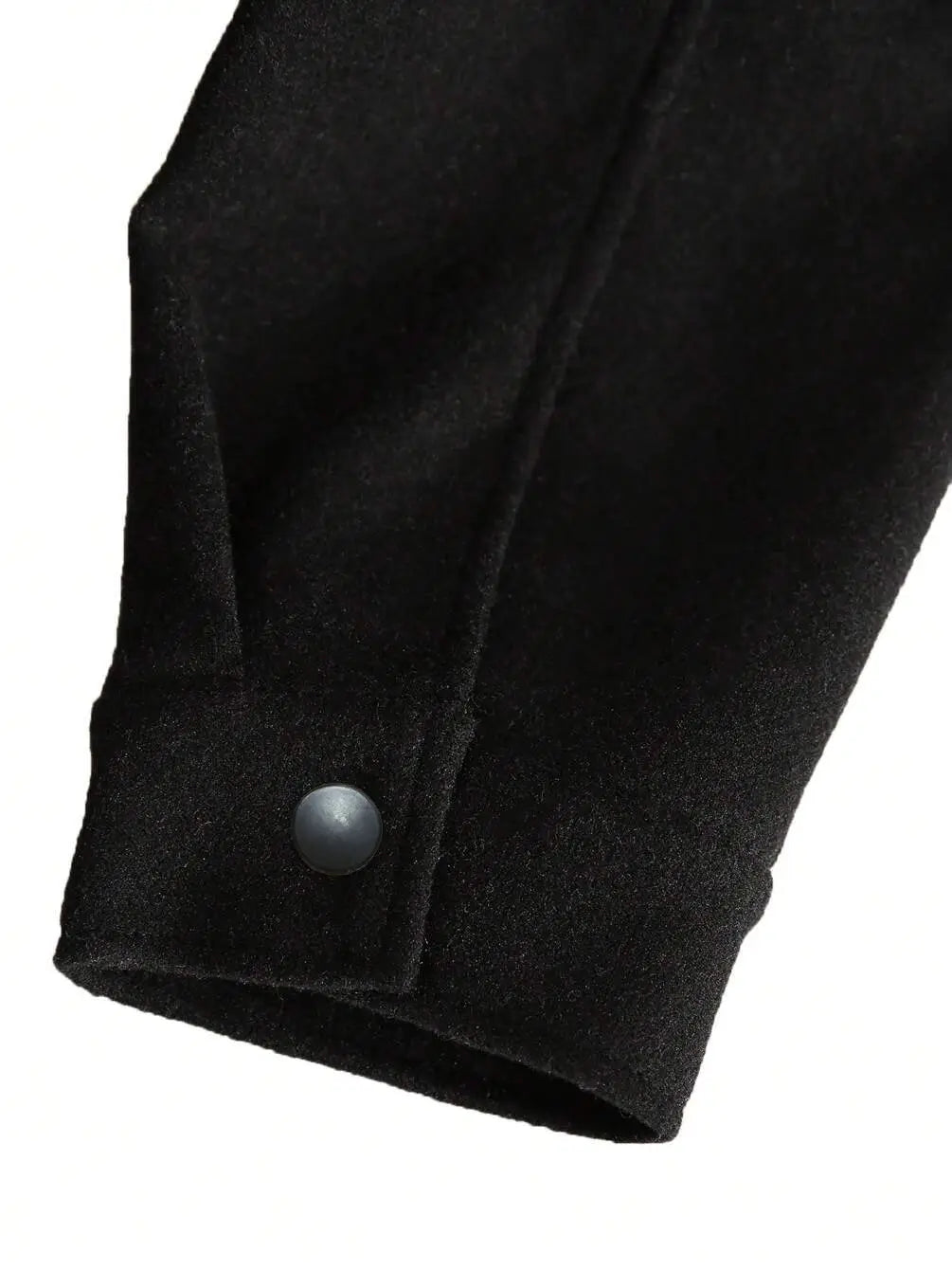 men’s classic slim fit wool blend lapel jacket showing a black suede cuff with a matte gray button.