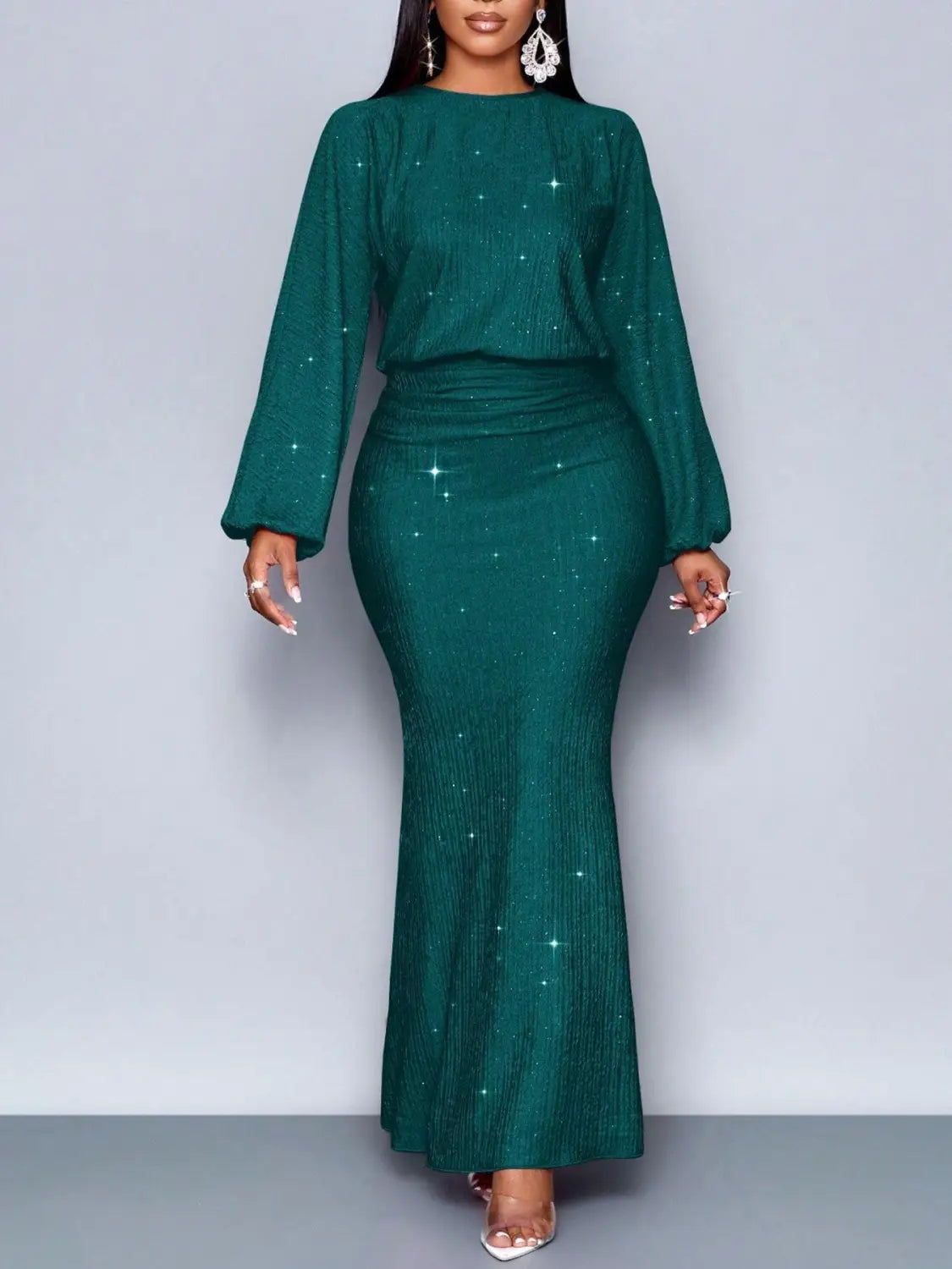 emerald green sequined mermaid-style two-piece set with long sleeves and a fitted waist featuring sequin lantern sleeves.