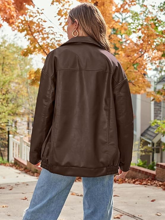 brown faux leather bomber jacket with oversized relaxed fit and elasticized waistband shown from the back side