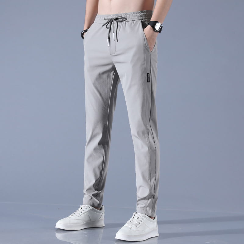 Men ice silk business casual pants in light gray featuring a drawstring waistband and subtle side stripes.
