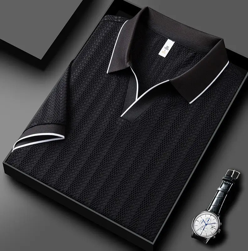 Men’s textured ice silk polo shirt in black with white contrast trim on collar and sleeve cuffs.