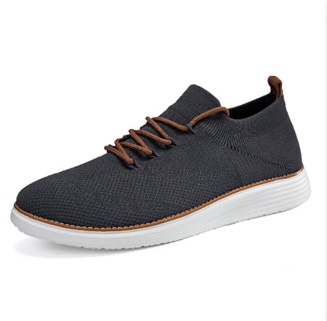 Men’s flyknit casual breathable lace up sneaker in dark gray knit with brown laces and a white rubber sole.
