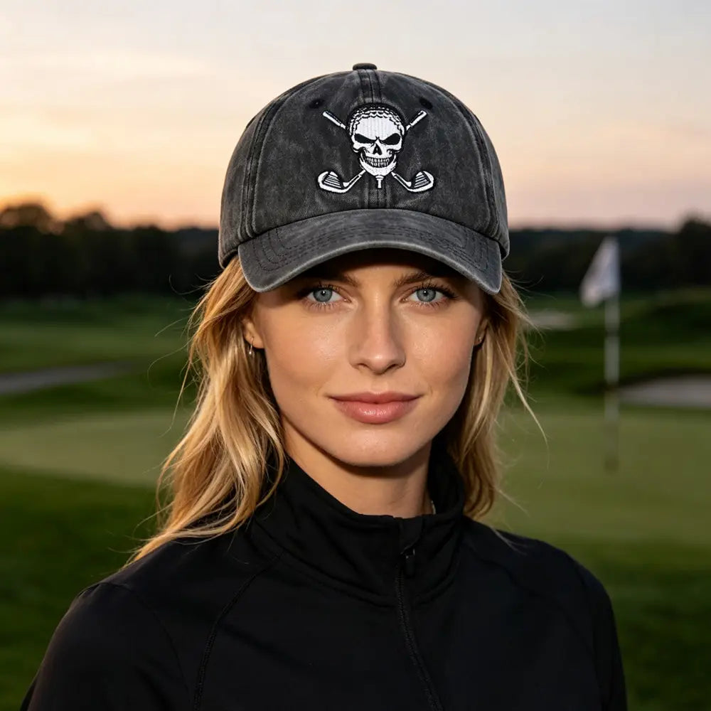 Dark gray distressed baseball cap made of vintage material featuring a white embroidered skull and crossed golf clubs design, ideal for golf enthusiasts.
