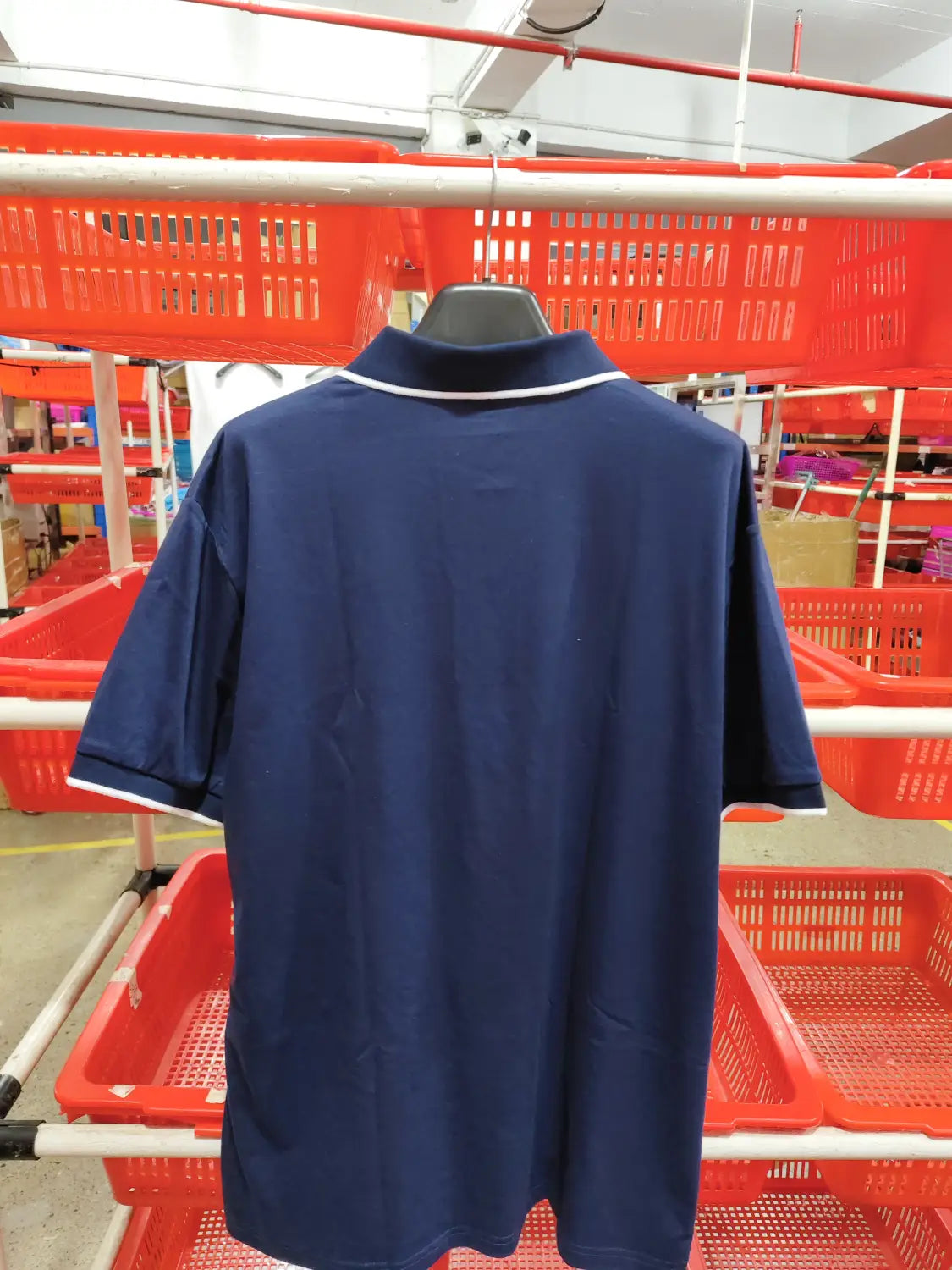 Men jacquard short sleeve polo shirt in navy blue with white trim on the collar and sleeve cuffs.