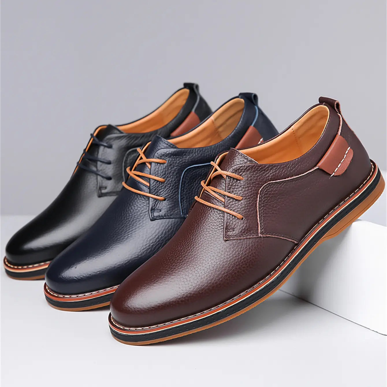 Men’s handmade genuine leather lace up oxford shoes in brown with tan laces and a contrasting stitched sole.