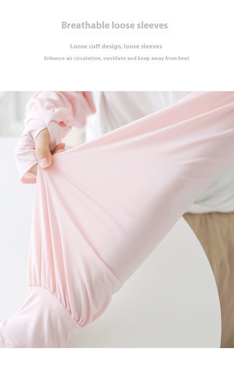Rosafarbene Eisseide-Sonnenschutz-Ärmelschützer mit atmungsaktiven, lockeren Ärmeln aus weichem, elastischem Material und elastischen Bündchen für Komfort und Belüftung.
