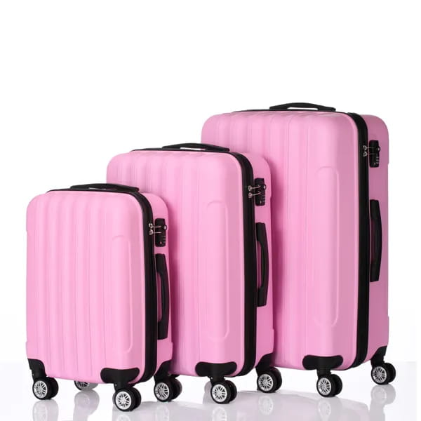 Set of three pink hard shell suitcases with black trim and wheels featuring large capacity for convenient travel organization.