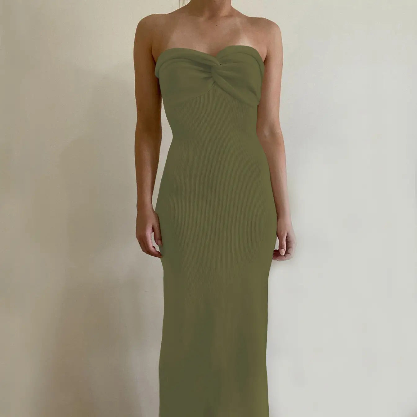 Olive green ribbed strapless midi dress with gathered bodice featuring an off shoulder knotted ribbed knit design.