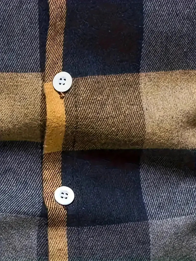white plastic buttons with four holes on a men’s slim fit plaid flannel button up shirt in dark blue and tan fabric